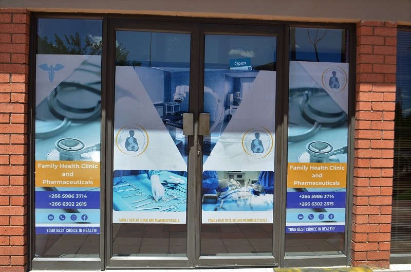 The branded glass entrance of Family Health Clinic & Pharmaceuticals at Thetsane Office Park