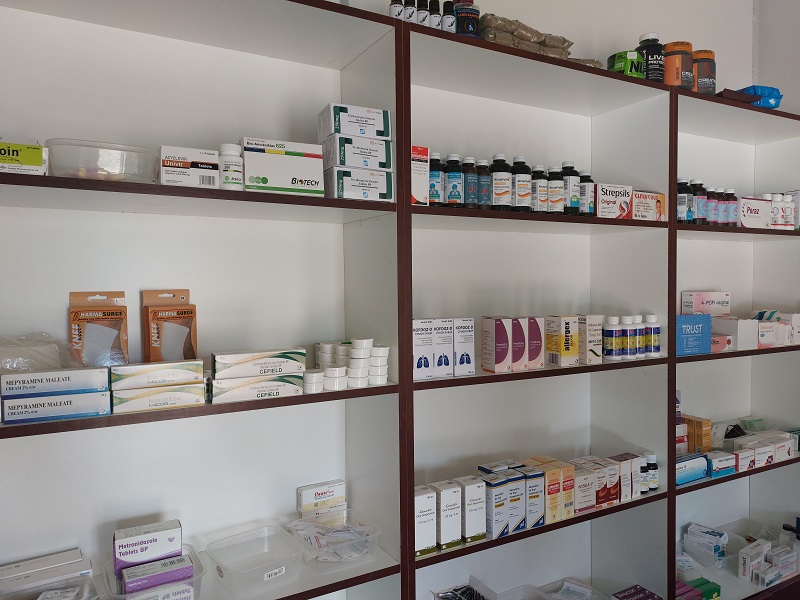 Stocked shelves in the Family Health Clinic pharmacy, holding prescription and over-the-counter medication